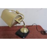 Adjustable brass desk style lamp