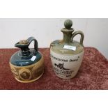 Stoneware Tullamore Dew Irish Whiskey decanter and a similar John Dewar & Sons Perth, Doulton