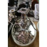 Pair of silver plated twin branch candlesticks, another single candlestick and an oval silver plated