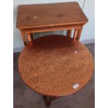 Nest of two pine occasional tables and a circular brass top pub style table on turned supports (2)