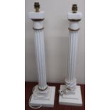 Large pair of white and gilt painted wooden Corinthian column table lamps on stepped square bases (