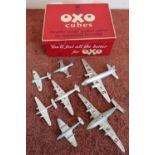 Vintage Oxo tin, containing a selection of various Dinky aircraft, sea planes etc