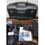 Box of various cameras including Canon Sureshot, Zenith EM camera, etc