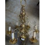 Elaborate brass six branch chandelier