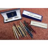 A selection of various carlton pens/ pencils etc including cased watermans pen etc.