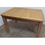 Modern light wood rectangular extending dining table on square supports