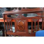 Late Victorian carved mahogany double bedstead with sprung base