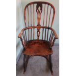 Ash and elm Windsor stick back arm chair with crinoline understretcher and turned supports