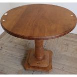 Yorkshire oak (acorn man) circular top table on turned column and stepped square base (76 cm