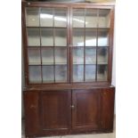 Late Victorian stained pine cabinet with upper three tier section enclosed by two glazed cupboard