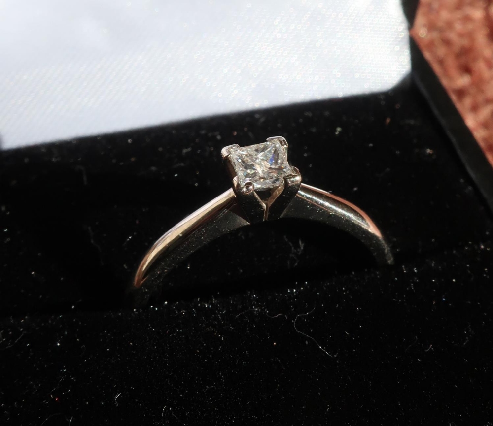 18ct white gold diamond solitaire ring with square cut diamond, approx .25ct (size Q)