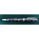 Conway Stewart ballpoint pen, marblised body with gold plated fittings, marked 'Conway Stewart