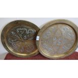 Pair of brass and white metal inlaid Indo Persian chargers with etched and engraved detail (diameter