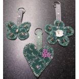 SAINT LEONARD'S HOSPICE FUNDRAISING LOT - Anonymous set of three homemade keyrings from staff