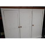 Quality modern contemporary pine and cream painted triple door wardrobe with two drawers to the base