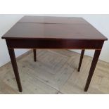 19th C mahogany rectangular fold over tea table with inlaid detail and square tapering supports (