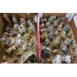 large collection of lilliput lane figures in 2 boxes including various castles and cottages,