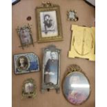 Late 19th C gilt brass easel photograph frame and a small collection of other similar photograph