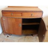 Circa 1920s/1930s oak sideboard with two drawers above two bow front cupboard doors (135cm x 55cm