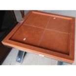 Modern design leather square top coffee table with polished steel X shaped base (60.5cm x 60.5cm x