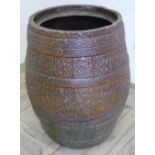 Earthen ware brown glazed planter in the form of a barrel (with crack)(height 50cm)