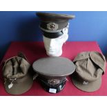 Two German postwar military officers peaked caps, and two ski caps (4)