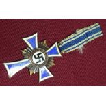 German WWII Third Reich enamel Mothers Cross medal, the reverse marked 16th December 1938