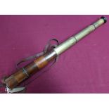Tan leather bound three drawer telescope marked Aitchison London, the field no.5380, complete with