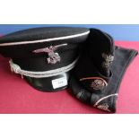 Two reproduction German SS sidecaps and officers peaked cap (3)