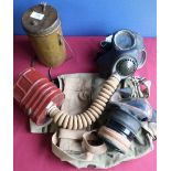 Two British c.WWII gas masks, gas mask cylinder, haversacks, canvas bandolier etc (for display