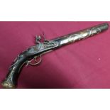 Turkish style flintlock pistol with 9 3/4 inch barrel, the stock with brass mounts, mother of