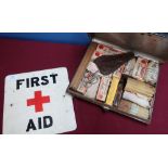 Alloy First Aid post sign and a early to mid 20th C paragon First Aid japped metal tin cased kit (2)