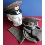 Selection of postwar German military headdress including two peaked caps, side cap and winter hat (