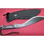 Gerber as new machete with blackened blade and webbing sheath