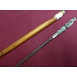 Late 19th C malacca sword cane with 24 inch single fullered blade, the white metal grip in the