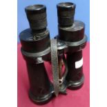 Pair of Barr & Stroud military issue binoculars, no.1900A with broad arrow marks, leather eye covers