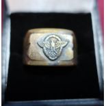 A German third reich brass signet ring with inset eagle above swastika