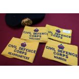 Four Civil Defence Corps arm bands, including Warden, Headquarters and Welfare and a civil defence