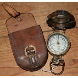 Brass cased military style marching compass with leather pouch marked Stanley, London
