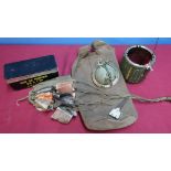 Rimfire cartridge tin, inert parachute mine, and canvas webbing pouch