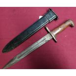 American bayonet with 9 3/4 inch blade, two piece wooden grips, composite body sheath marked US