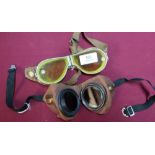 Pair of c.WWII Air Ministry red tinted goggles and a pair of dispatch style riders yellow tinted