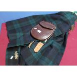 Black watch tartan kilt with associated sporran WD broadarrow mark CAT.NO.CT.0290 dated 1950