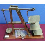 Brass GPO broad arrow stamped, three bar graduating scales mounted on wooden plinth with small