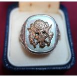 An American white and yellow metal mother of pearl marine corp signet ring