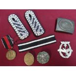 Selection of German WWII medals and badges including some possible repro, Luftwaffe belt buckle,