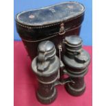 Cased pair of c.WWII kriegsmarine binoculars containing various rubber mounts, marked 7x50 BEH,