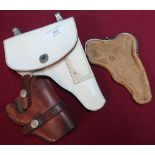 Walther white leather pistol holster, a Smith & Western leather pistol holster, and a late 19th C