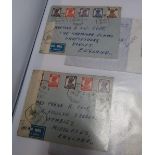 Folder of various WWII period envelopes with various postage stamps, including Indian, various