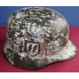 M35 German c.WWII steel SS helmet complete with original leather liner and chinstrap, retaining